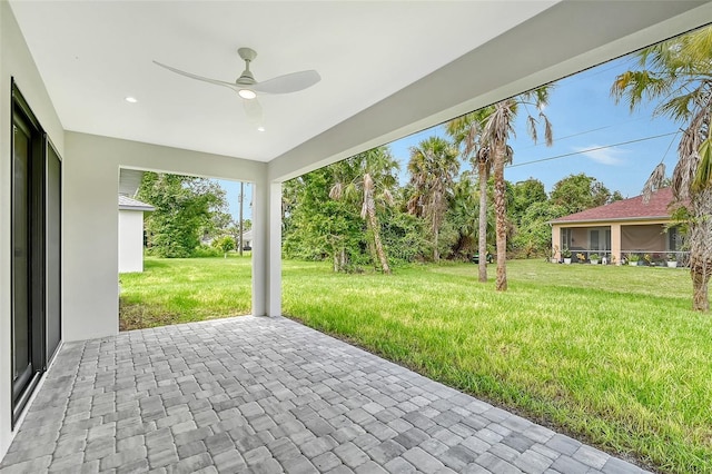 view of patio / terrace featuring ceiling fan