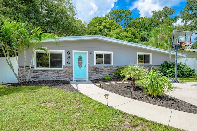 view of front of property with a front lawn