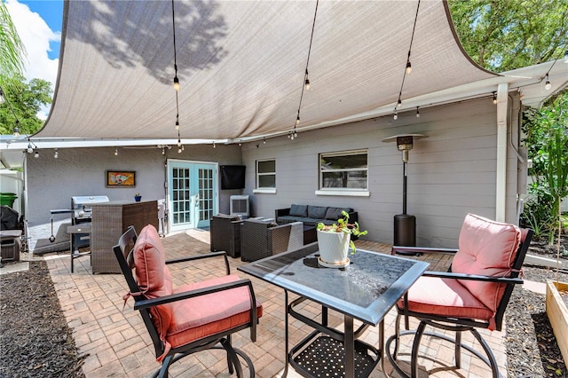 view of patio featuring an outdoor hangout area and french doors