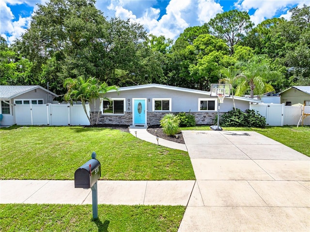 ranch-style house with a front yard