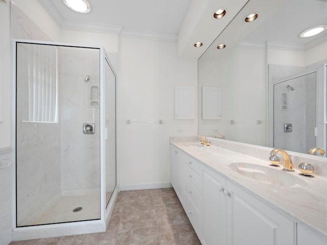 bathroom with crown molding, a shower with door, vanity, and tile patterned flooring