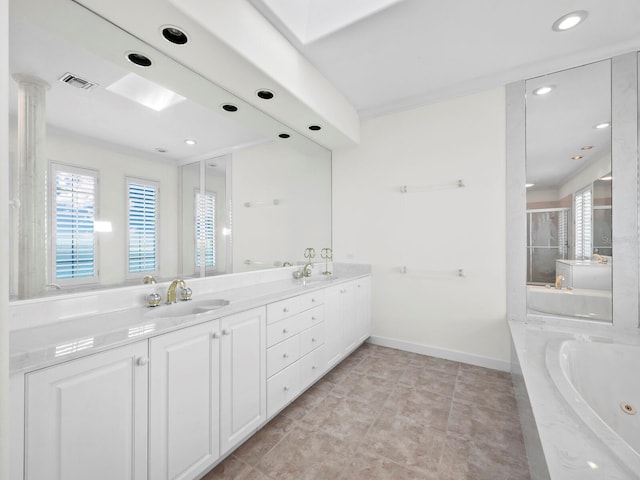 bathroom featuring tile patterned flooring, vanity, and independent shower and bath