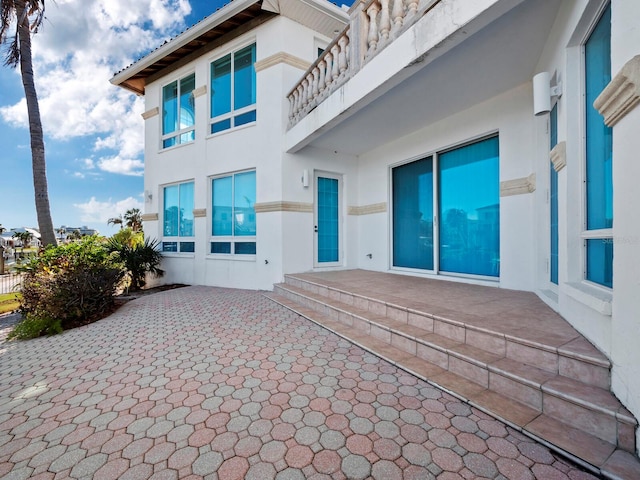 rear view of property featuring a patio