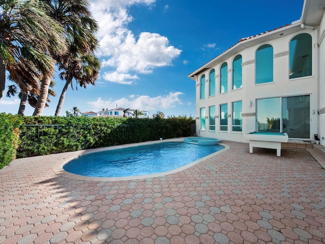 view of pool with a patio