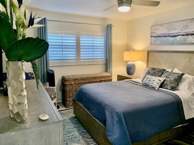 8630 Midnight Pass Rd Unit 103A, Sarasota, FL 34242 - bedroom with ceiling fan