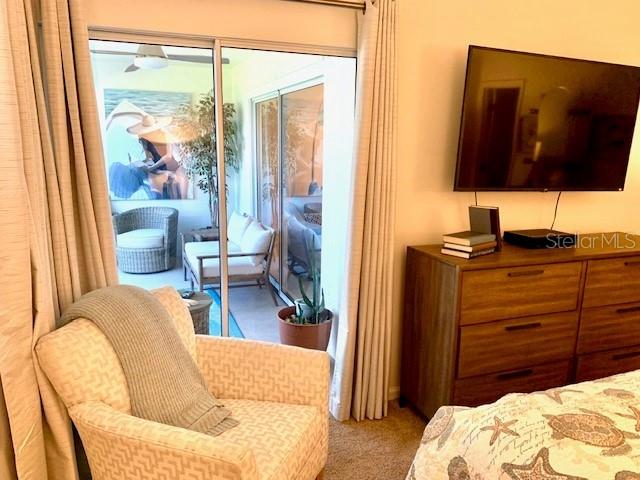 8630 Midnight Pass Rd Unit 103A, Sarasota, FL 34242 - bedroom featuring carpet floors