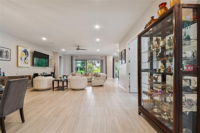 living room featuring ceiling fan