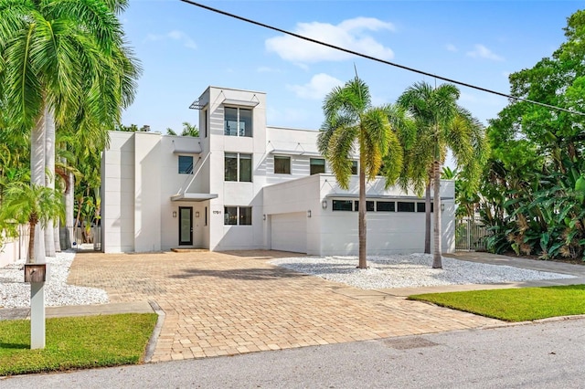 view of front of property with a garage