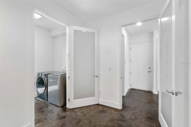 laundry room featuring separate washer and dryer