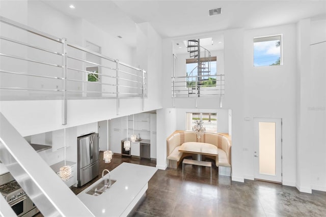 interior space with a wealth of natural light and sink