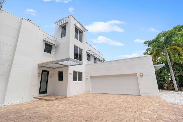 modern home featuring a garage