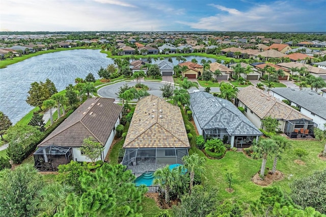 bird's eye view with a water view