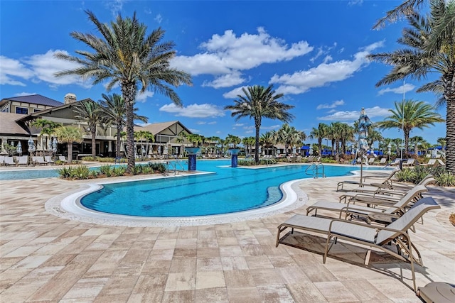 view of swimming pool featuring a patio