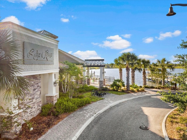 view of home's community featuring a water view