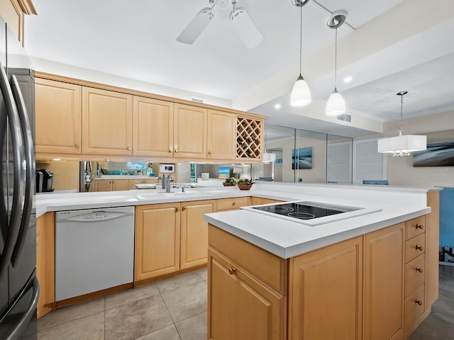 kitchen featuring dishwasher, decorative light fixtures, electric cooktop, sink, and ceiling fan