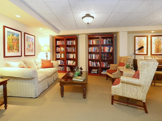 sitting room featuring carpet flooring