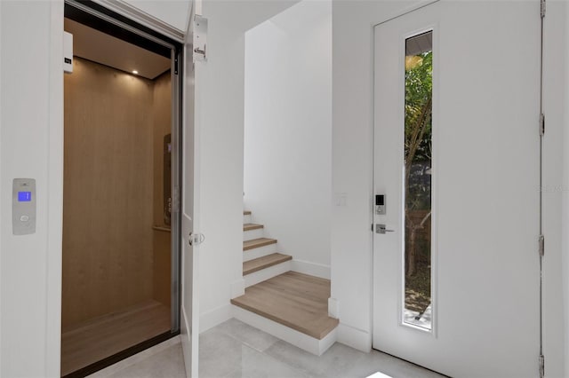 doorway to property featuring elevator