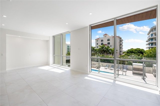 empty room featuring expansive windows