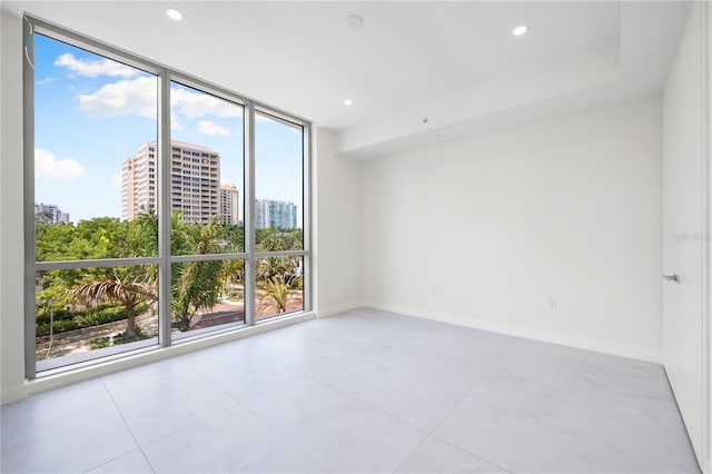 empty room featuring expansive windows