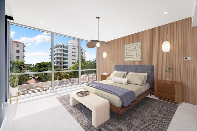 bedroom featuring a wall of windows