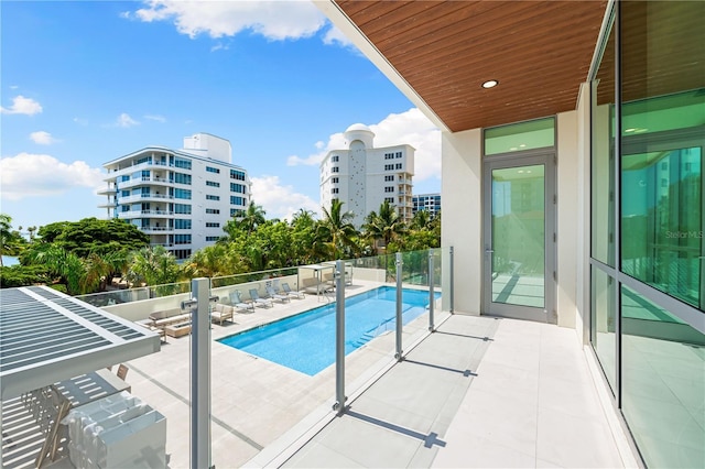 view of pool featuring a patio