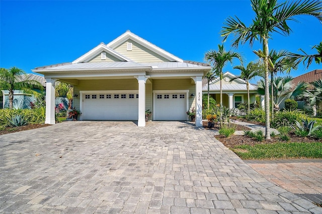 view of front of property with a garage