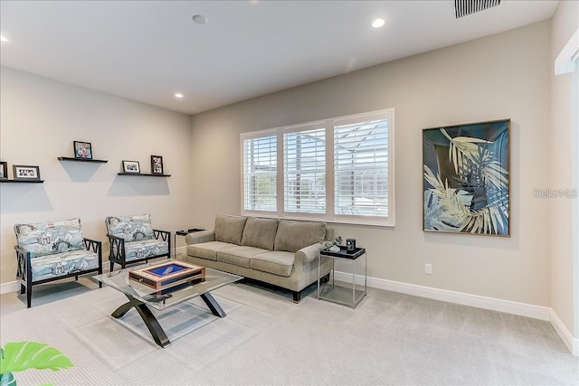 living room featuring light colored carpet