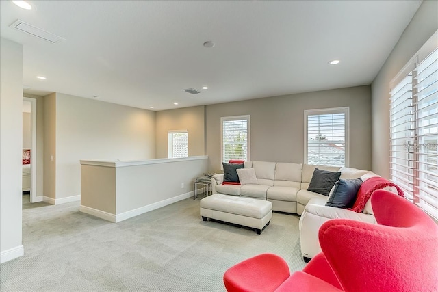 living room with light colored carpet