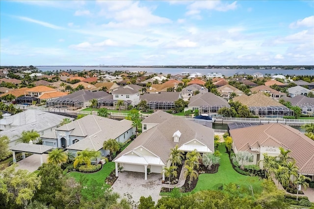 drone / aerial view featuring a water view