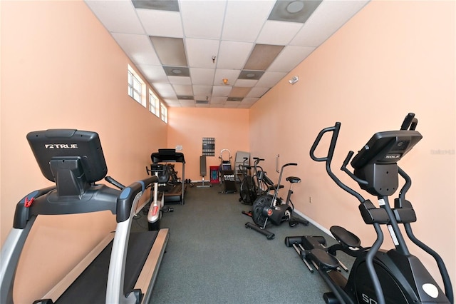 exercise room featuring a drop ceiling