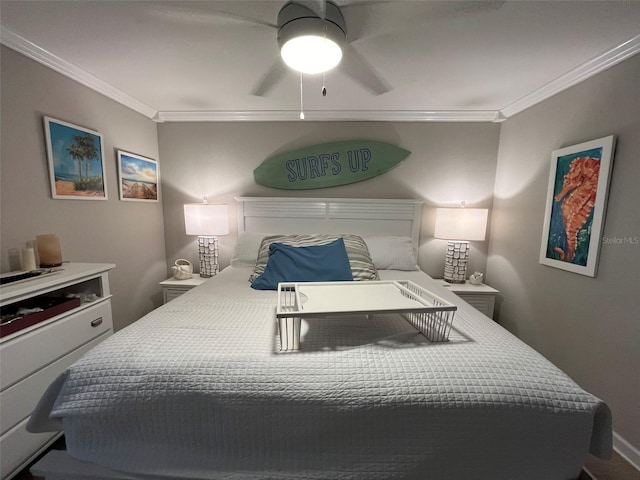 bedroom with ornamental molding and ceiling fan