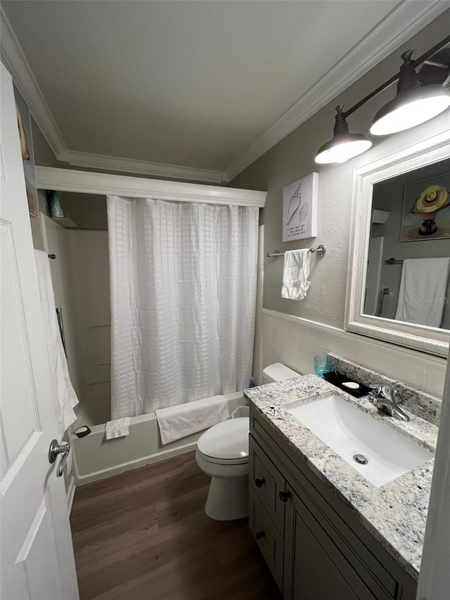 full bathroom featuring ornamental molding, vanity, toilet, and shower / bathtub combination with curtain