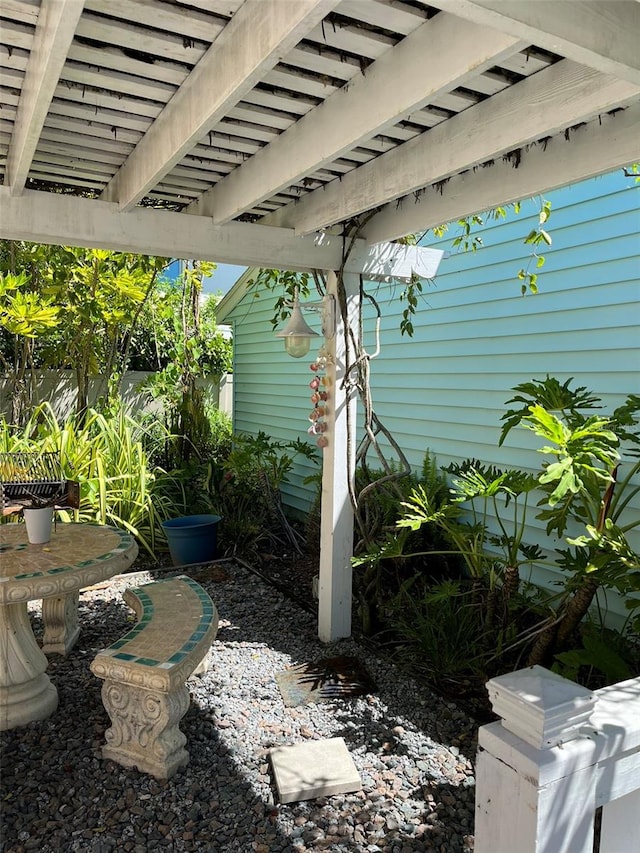 exterior space with a pergola