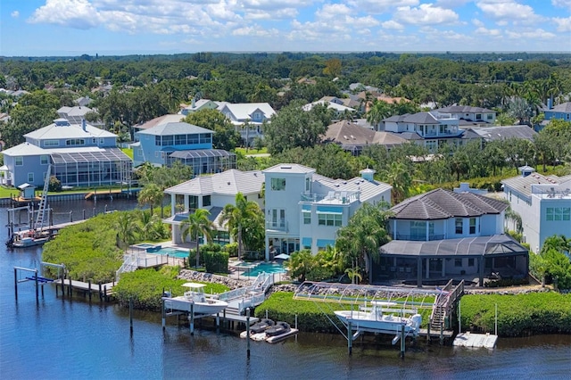 bird's eye view with a water view