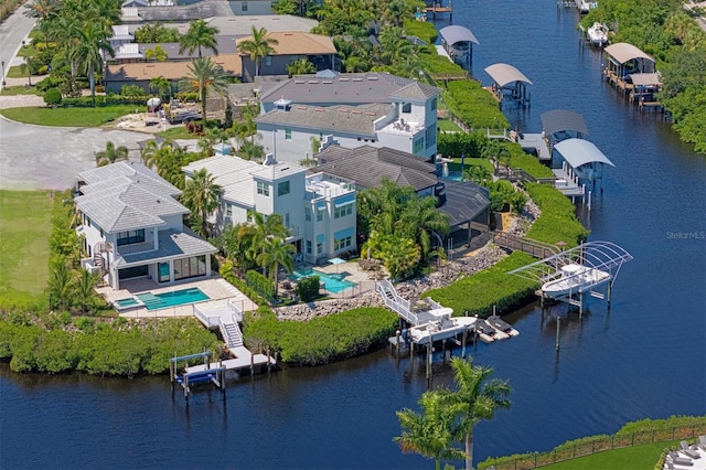 bird's eye view with a water view