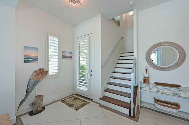 entrance foyer with light tile patterned flooring