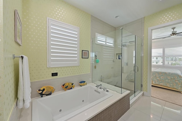 bathroom featuring ceiling fan, independent shower and bath, and tile patterned flooring