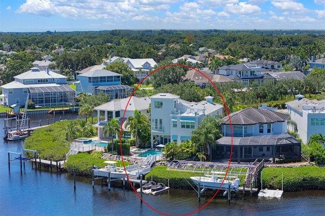 birds eye view of property featuring a water view