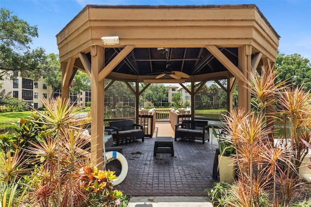 view of patio / terrace featuring ceiling fan and a gazebo