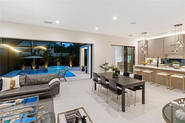 dining room featuring sink