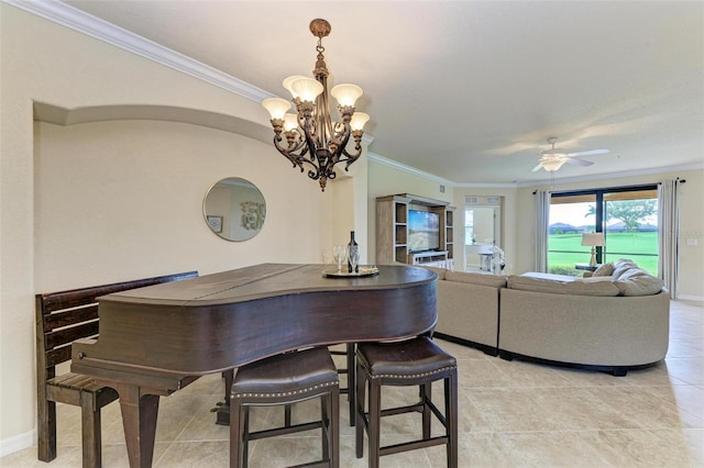 dining area featuring light tile patterned floors, ornamental molding, and ceiling fan with notable chandelier