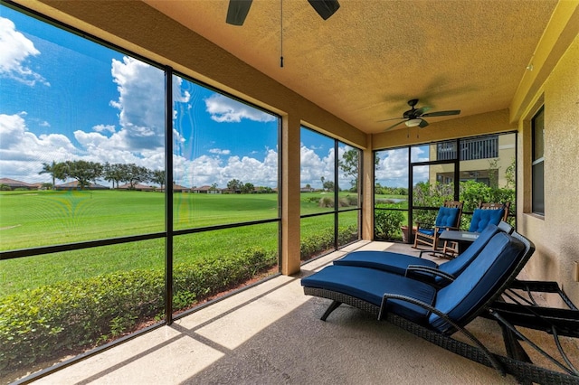 sunroom / solarium with ceiling fan