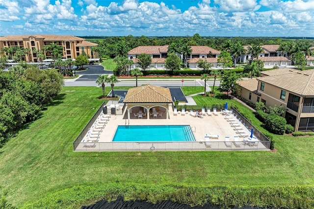 view of swimming pool featuring a patio area, a lawn, and a gazebo