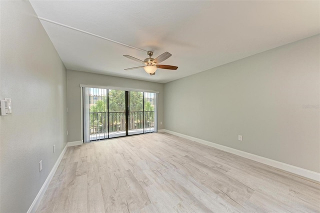 unfurnished room featuring light wood-type flooring and ceiling fan