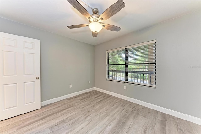 unfurnished room featuring light wood-type flooring and ceiling fan