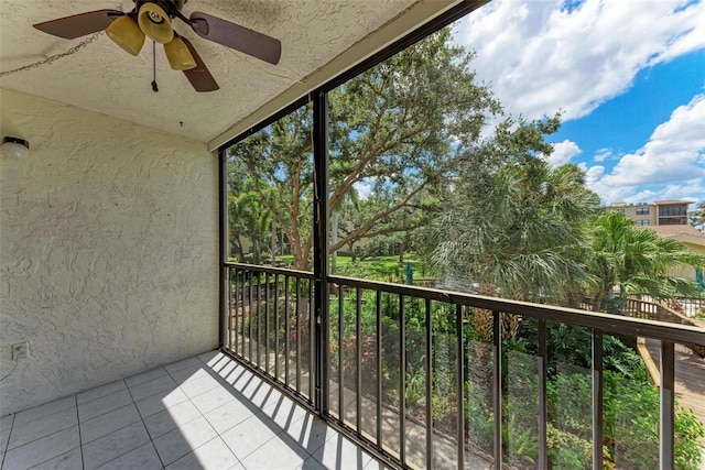 balcony featuring ceiling fan