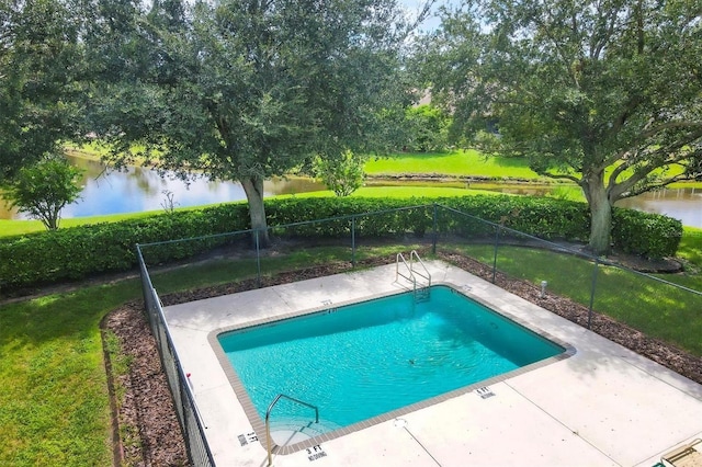 view of pool featuring a fenced in pool, a water view, a yard, and fence