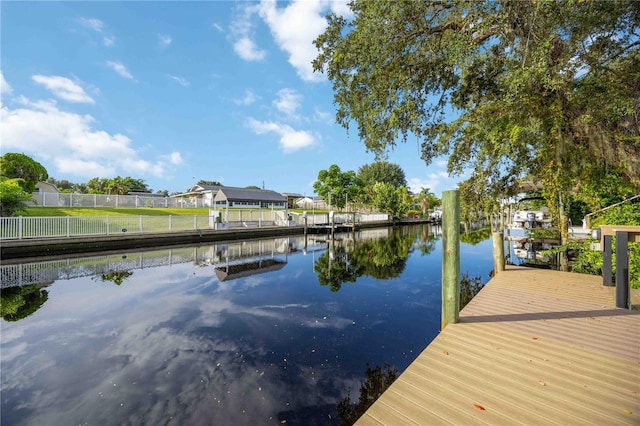 dock area with a water view