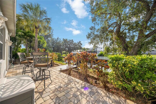 view of patio with outdoor dining space