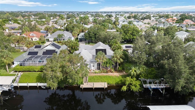 aerial view with a residential view and a water view